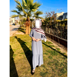 Daisy Maxi Dress in Light Grey, featuring a flowing silhouette and soft fabric, perfect for a variety of occasions with an elegant, understated look.